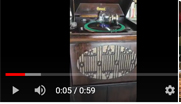 A Restored Brunswick Gramaphone Playing a Record